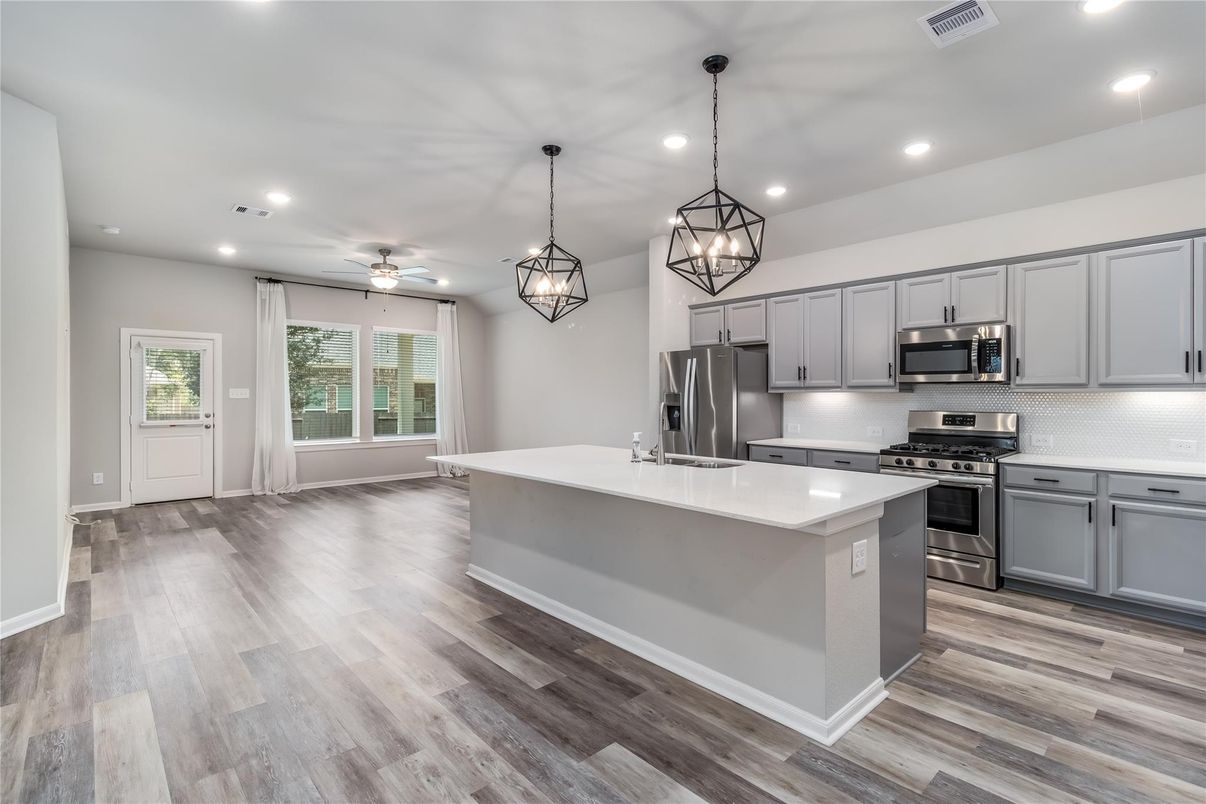 Interior, Kitchen, Pendant Lights, Recessed Lighting, Stainless Steel Appliances, Wood Texture Flooring