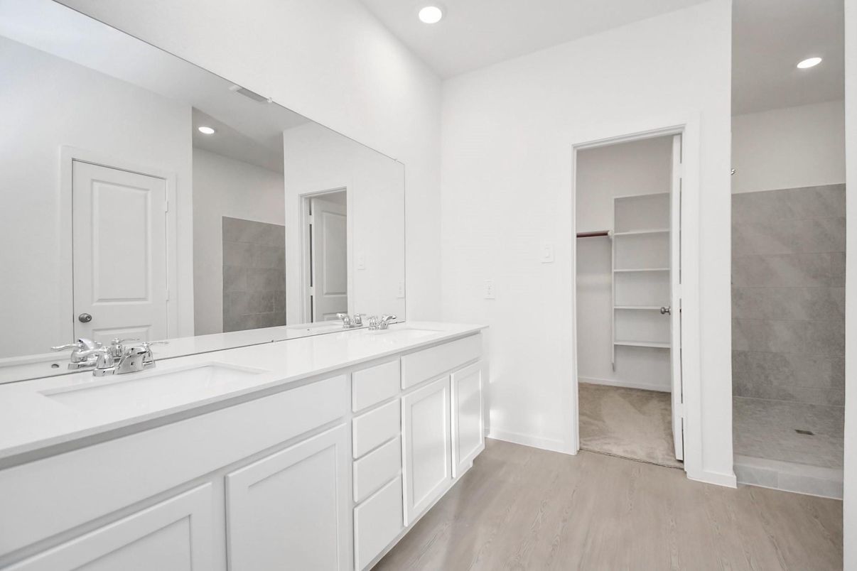 Bathroom, Dual Sink Vanities, Interior, Recessed Lighting, Walk-in Closets, Wood Texture Flooring