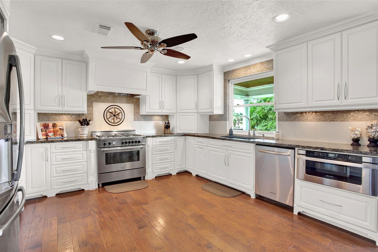 Interior, Kitchen, Recessed Lighting, Stainless Steel Appliances, Wood Texture Flooring