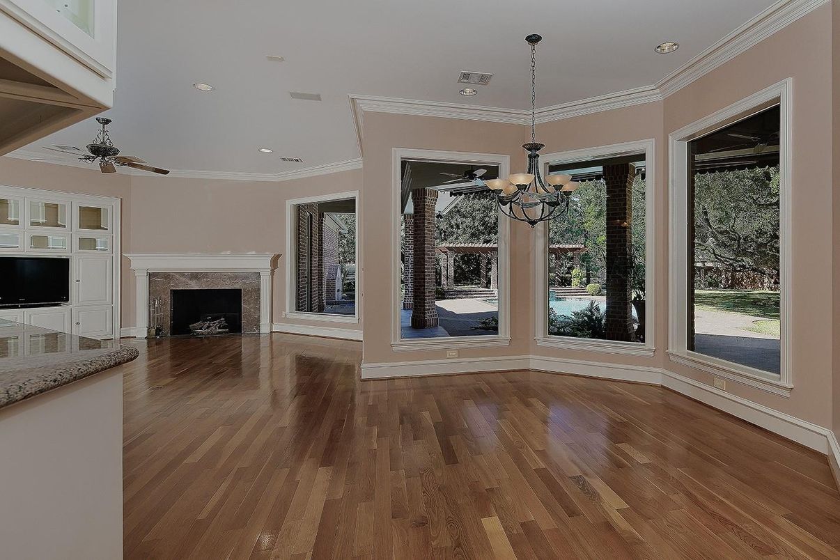 Empty room, Fireplace, Interior, Pendant Lights, Recessed Lighting, Wood Texture Flooring