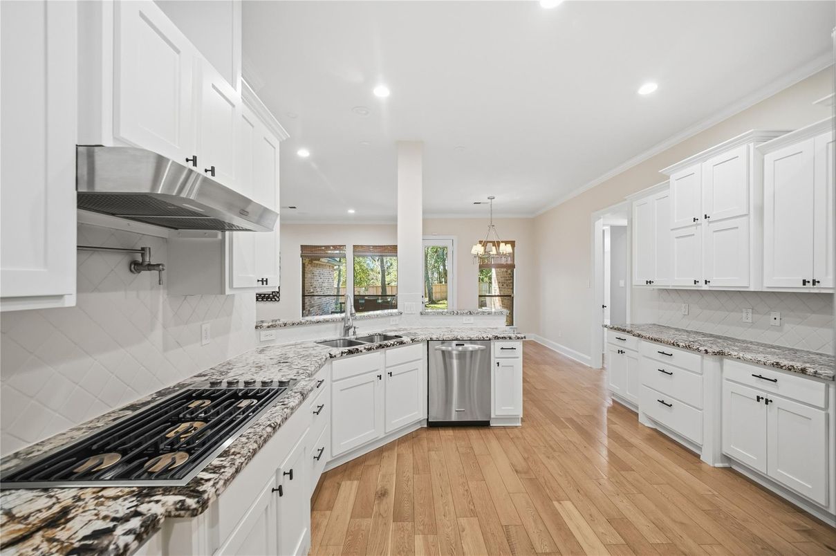 Chandelier, Interior, Kitchen, Pendant Lights, Recessed Lighting, Stainless Steel Appliances, Wood Texture Flooring