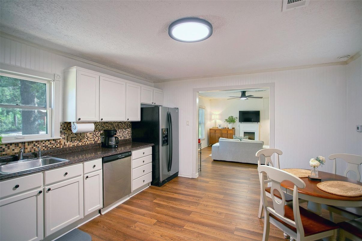 Dining room, Fireplace, Interior, Kitchen, Wood Texture Flooring