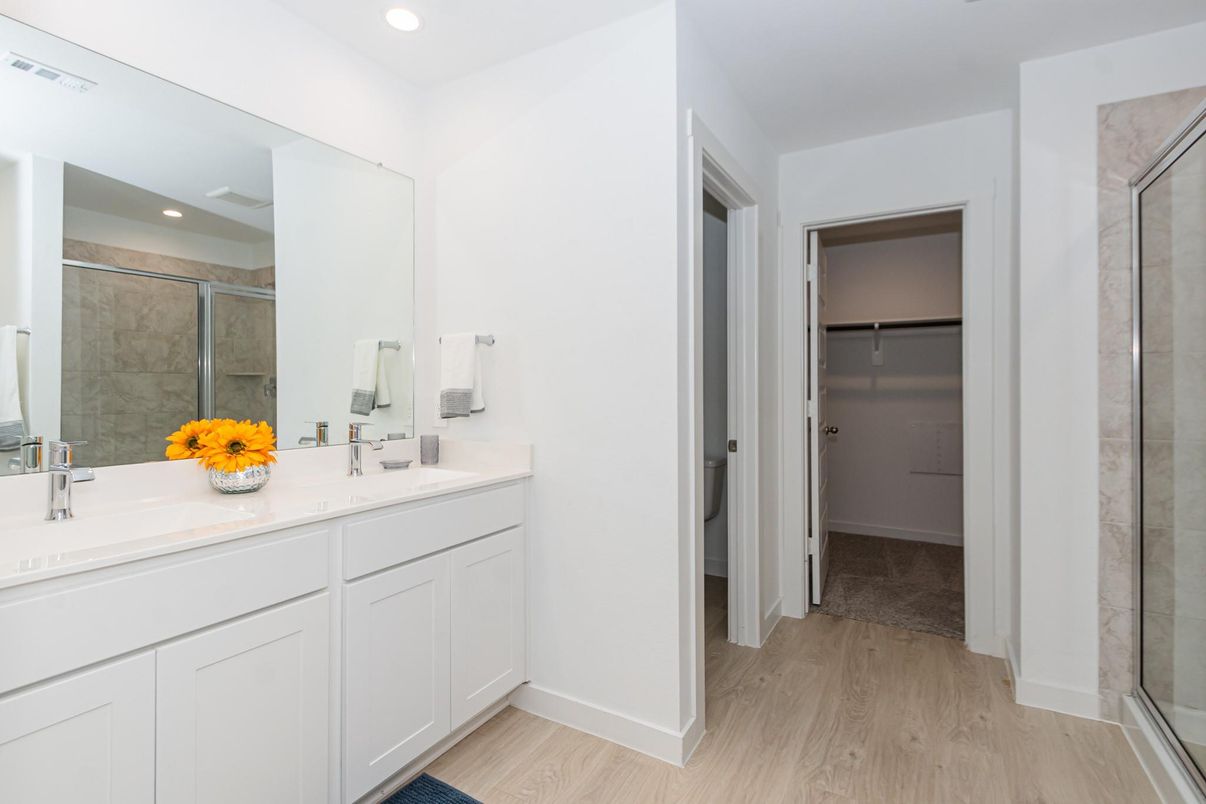 Bathroom, Dual Sink Vanities, Glass Shower, Interior, Recessed Lighting, Wood Texture Flooring