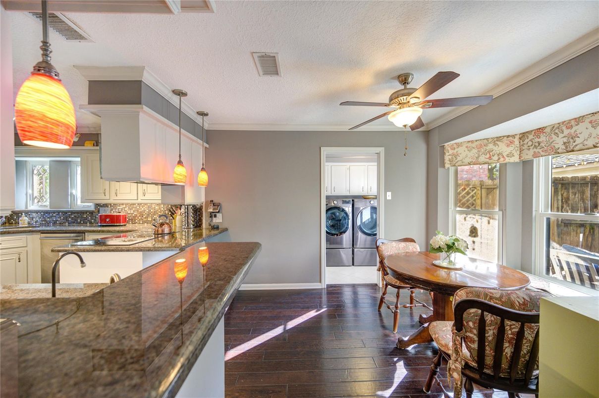 Dining room, Interior, Kitchen, Pendant Lights, Washer, Wood Texture Flooring