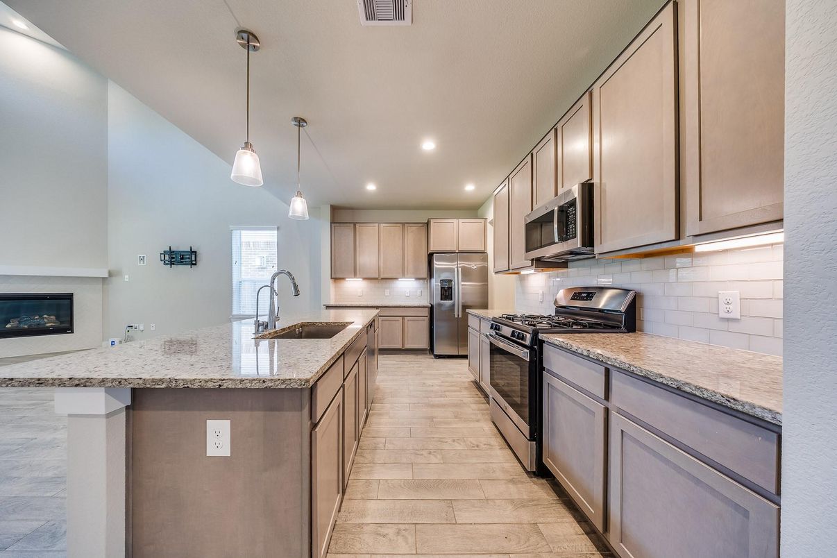 Fireplace, Interior, Kitchen, Pendant Lights, Recessed Lighting, Stainless Steel Appliances, Wood Texture Flooring