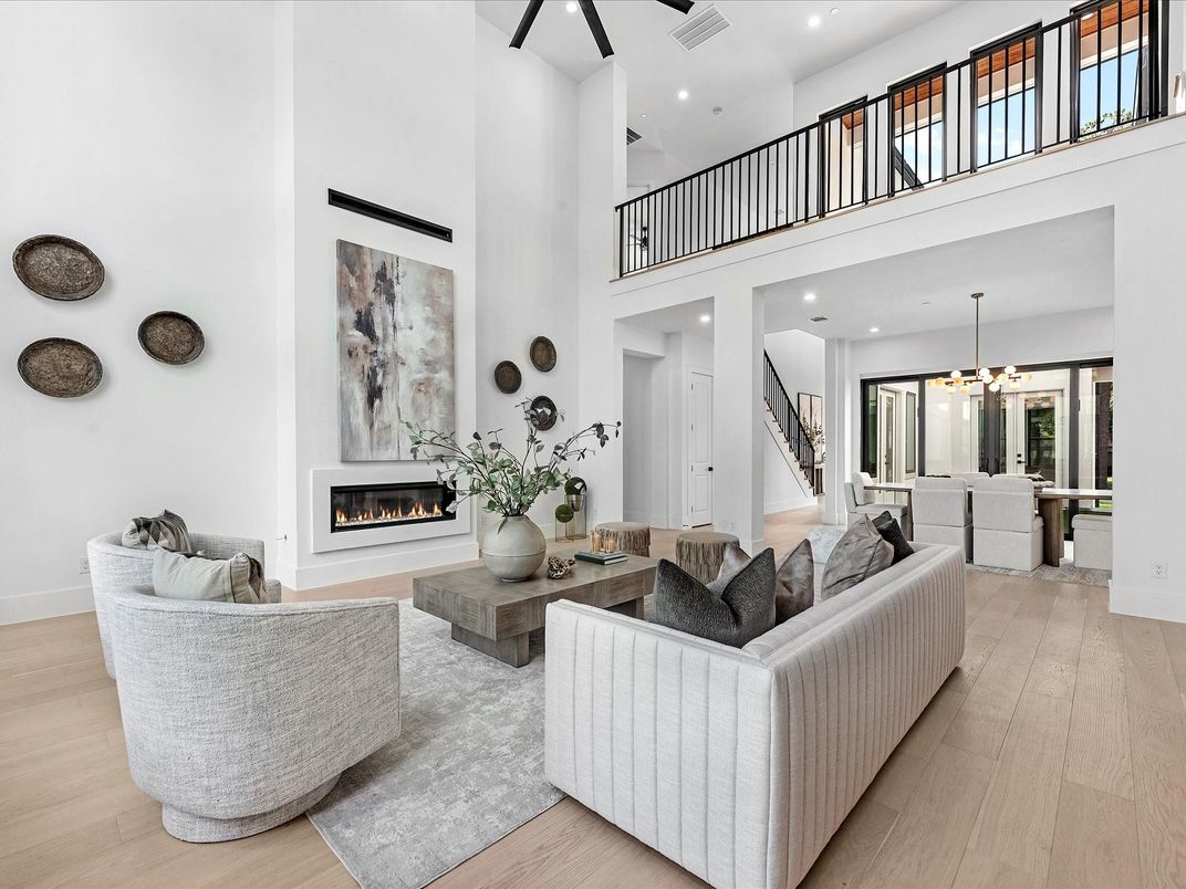 Dining room, Fireplace, Interior, Living room, Pendant Lights, Recessed Lighting, Wood Texture Flooring