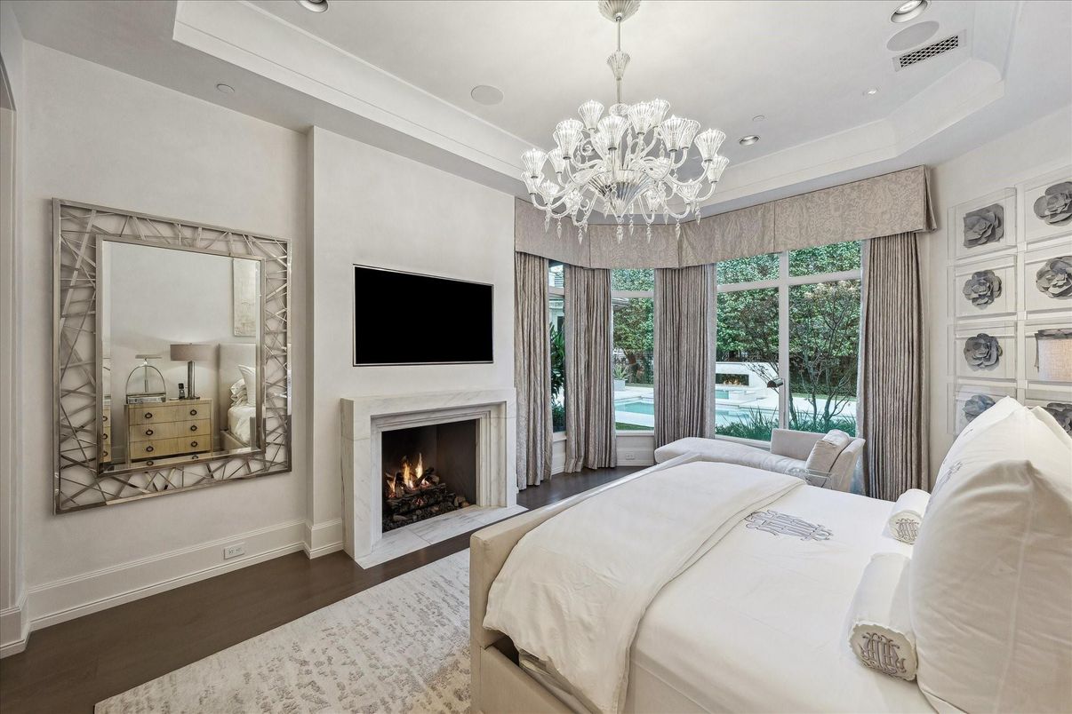 Bedroom, Chandelier, Fireplace, Interior, Recessed Lighting, Wood Texture Flooring