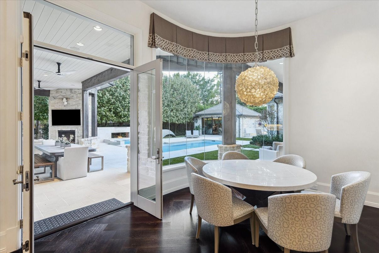 Dining room, Fireplace, Interior, Living room, Pendant Lights, Recessed Lighting, Wood Texture Flooring