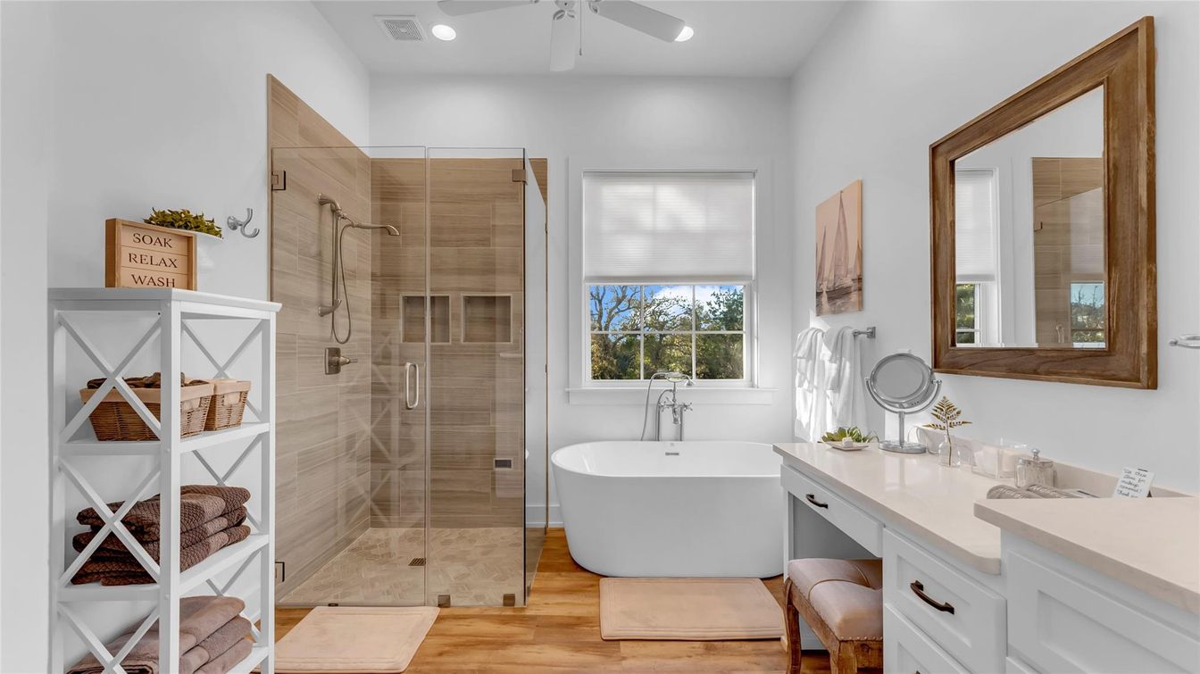 Bathroom, Free Standing Baths, Glass Shower, Interior, Recessed Lighting, Wood Texture Flooring