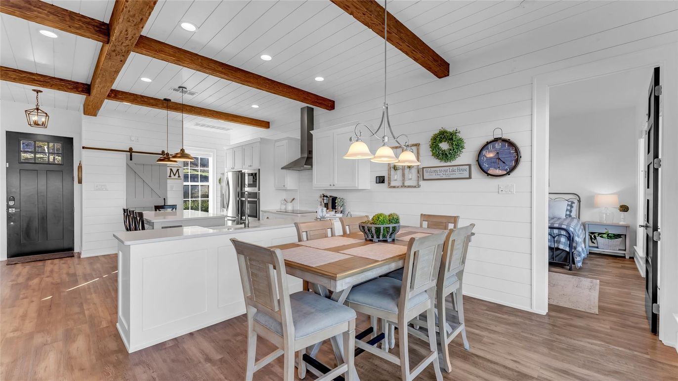 Dining room, Interior, Kitchen, Pendant Lights, Recessed Lighting, Stainless Steel Appliances, Wooden Beams, Wood Texture Flooring