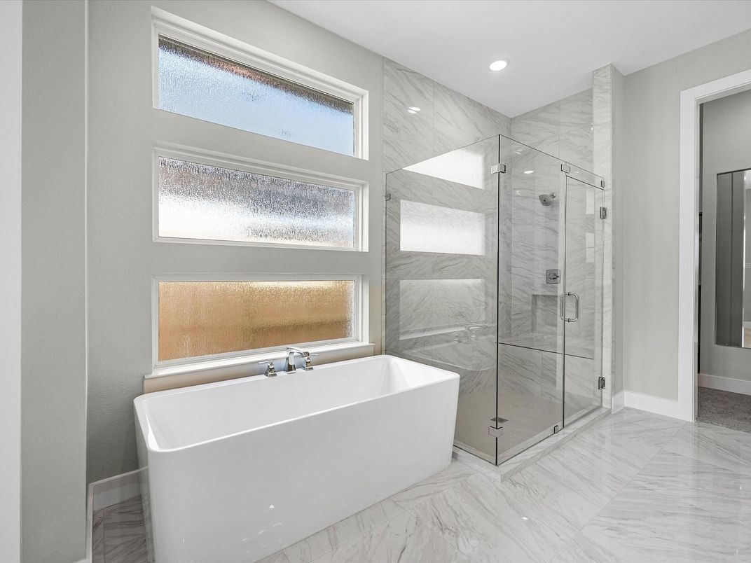 Bathroom, Free Standing Baths, Glass Shower, Interior, Marble, Marble Walls, Recessed Lighting