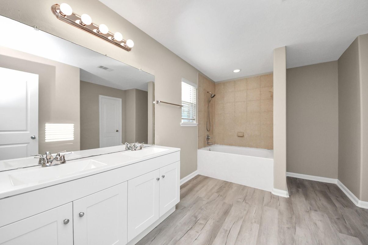 Bathroom, Dual Sink Vanities, Interior, Recessed Lighting, Wood Texture Flooring