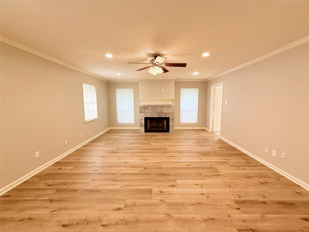 Empty room, Fireplace, Interior, Recessed Lighting, Wood Texture Flooring