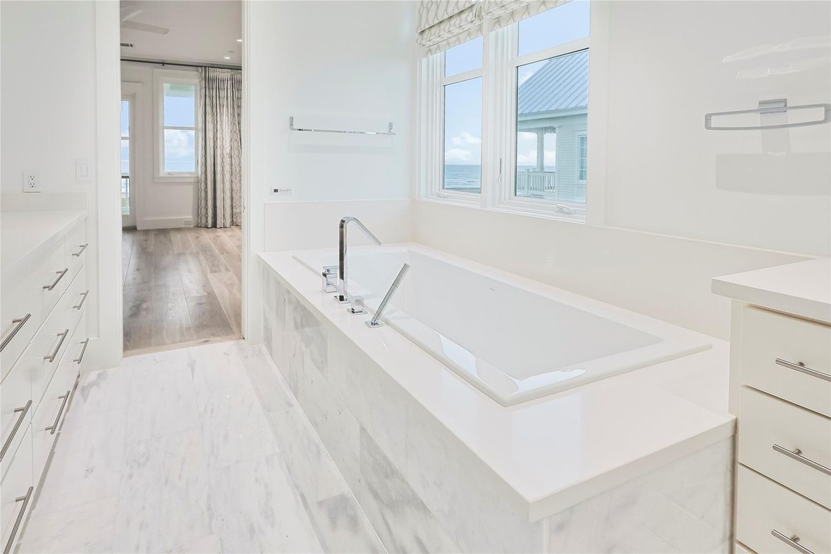 Bathroom, Dual Sink Vanities, Interior, Marble, Recessed Lighting, Water, Wood Texture Flooring