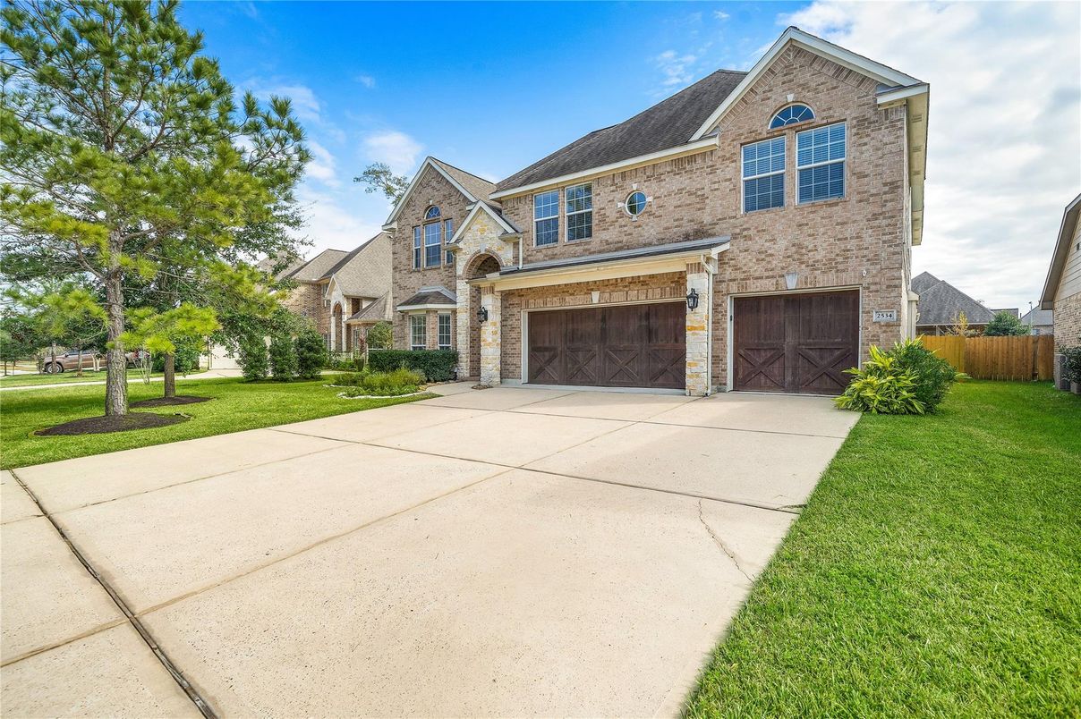 Attached, Exterior, Facade, Brick Facade, Brick Traditional