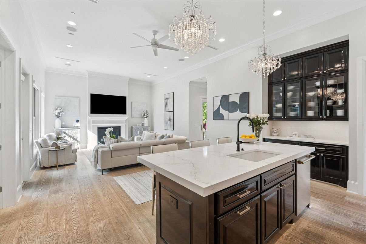 Chandelier, Fireplace, Interior, Kitchen, Living room, Recessed Lighting, Wood Texture Flooring