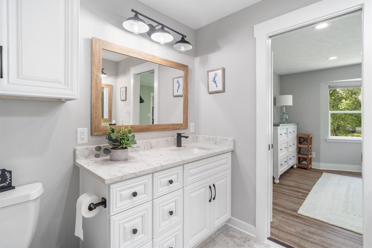 Bathroom, Dual Sink Vanities, Interior, Recessed Lighting, Wood Texture Flooring