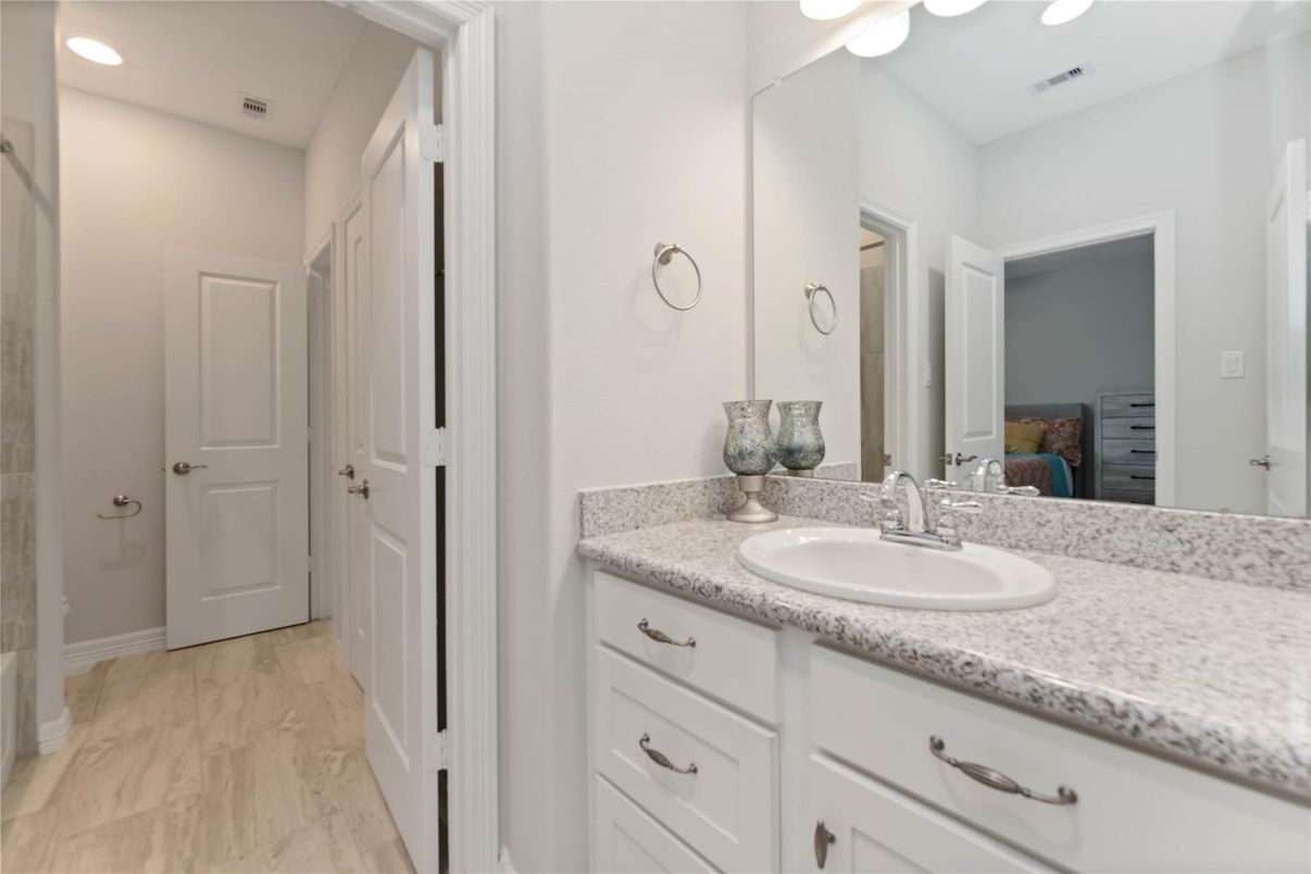 Bathroom, Dual Sink Vanities, Interior, Recessed Lighting, Wood Texture Flooring