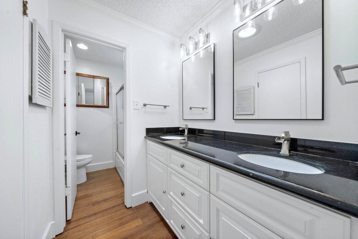 Bathroom, Dual Sink Vanities, Interior, Recessed Lighting, Wood Texture Flooring