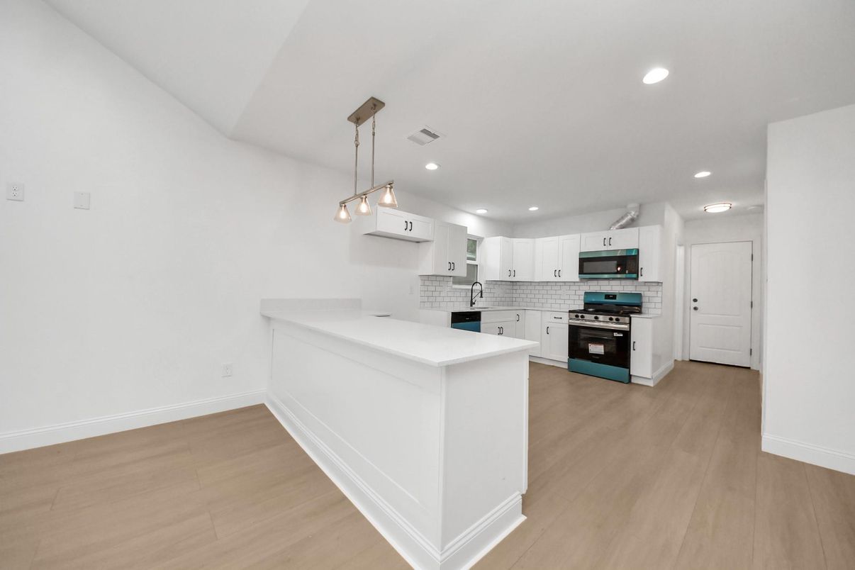 Interior, Kitchen, Pendant Lights, Recessed Lighting, Stainless Steel Appliances, Wood Texture Flooring