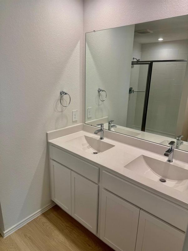 Bathroom, Dual Sink Vanities, Interior, Recessed Lighting, Wood Texture Flooring