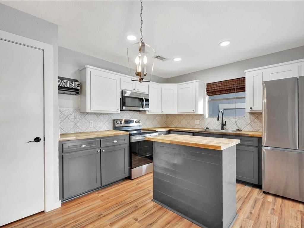 Interior, Kitchen, Pendant Lights, Recessed Lighting, Stainless Steel Appliances, Wood Texture Flooring