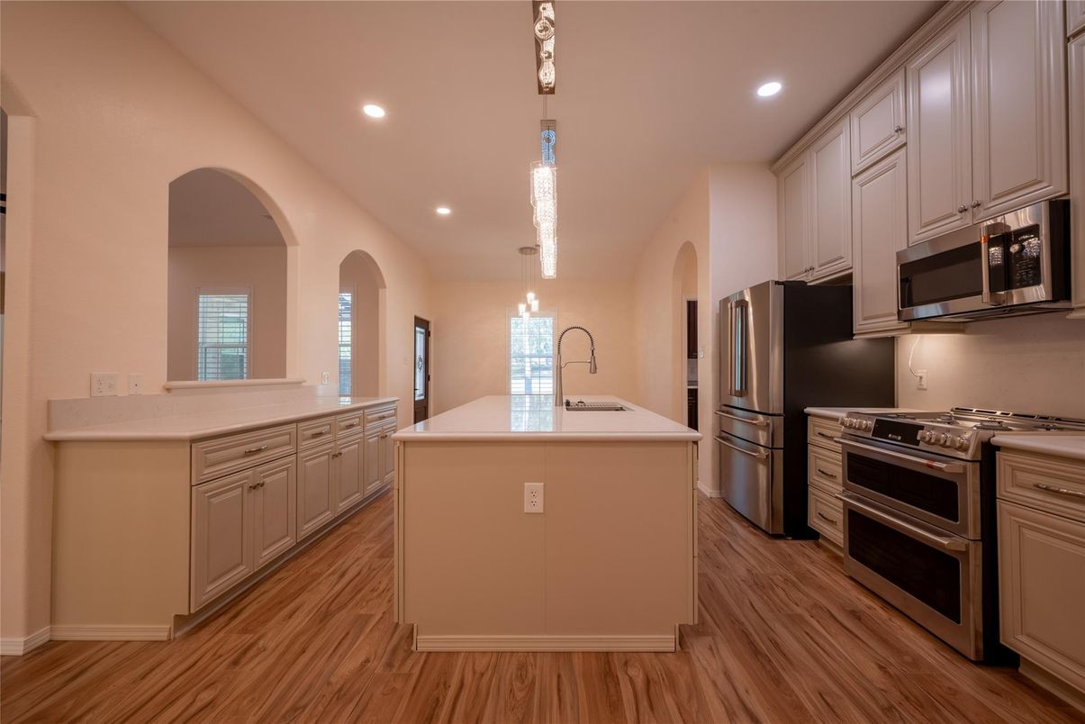 Interior, Kitchen, Pendant Lights, Recessed Lighting, Stainless Steel Appliances, Wood Texture Flooring