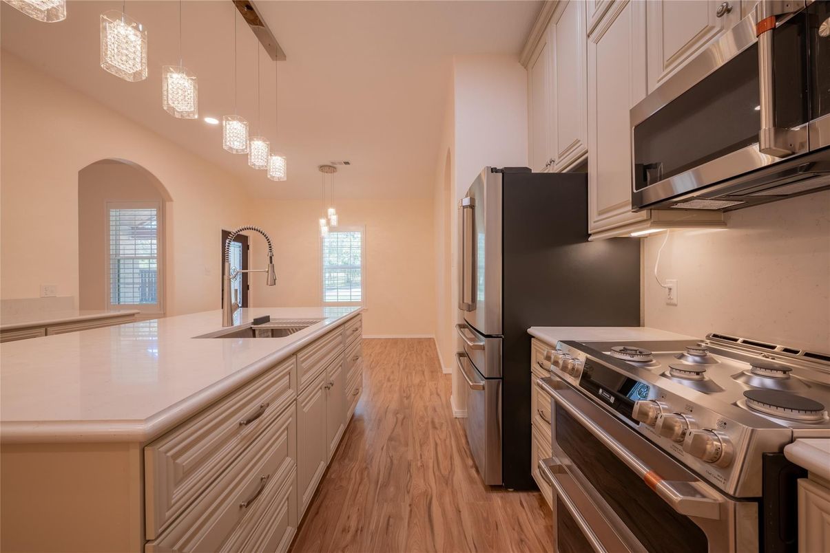 Chandelier, Interior, Kitchen, Pendant Lights, Stainless Steel Appliances, Wood Texture Flooring