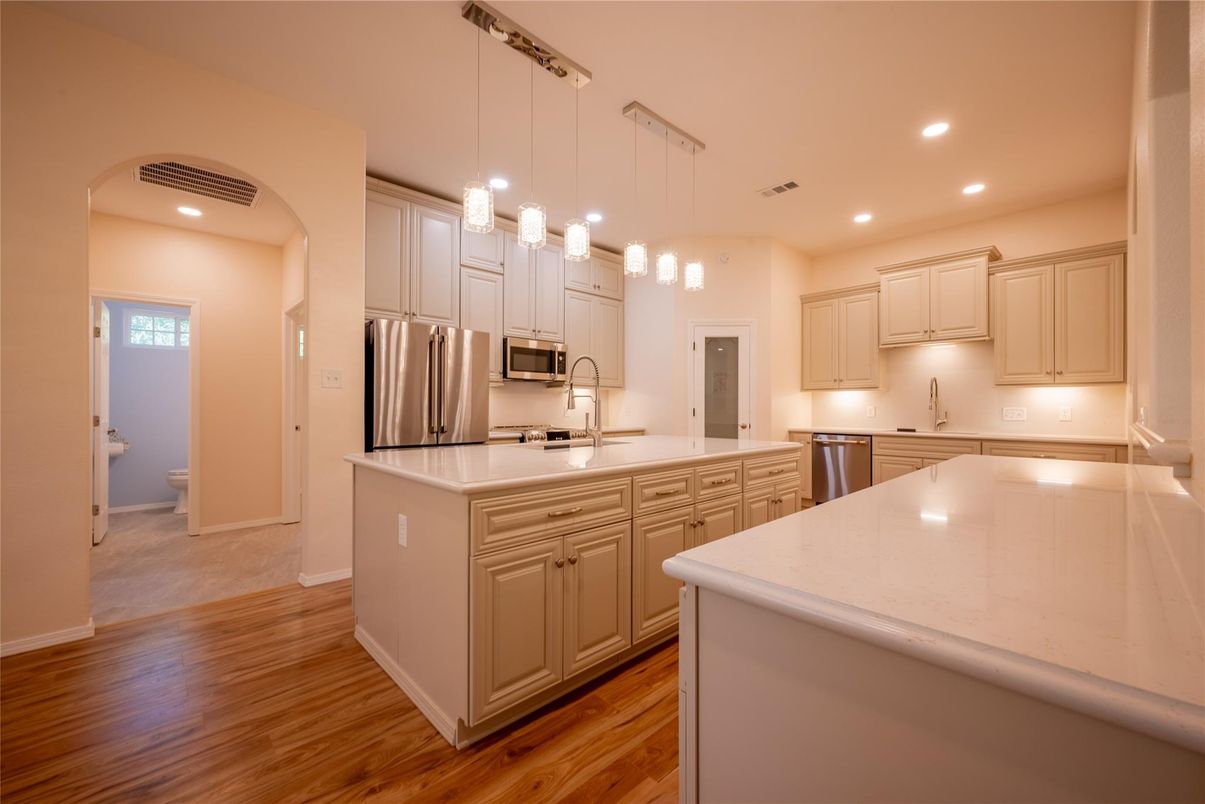 Interior, Kitchen, Pendant Lights, Recessed Lighting, Stainless Steel Appliances, Wood Texture Flooring
