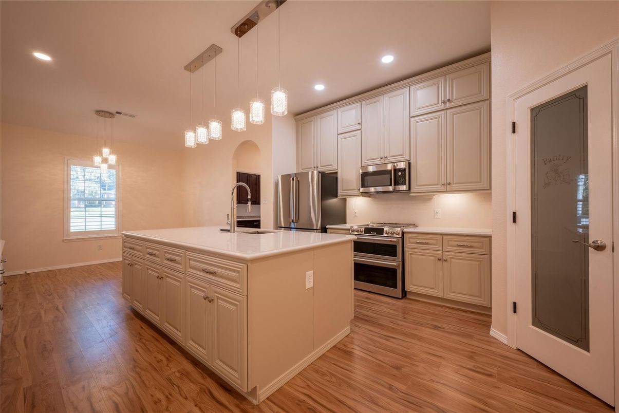 Interior, Kitchen, Pendant Lights, Recessed Lighting, Stainless Steel Appliances, Wood Texture Flooring