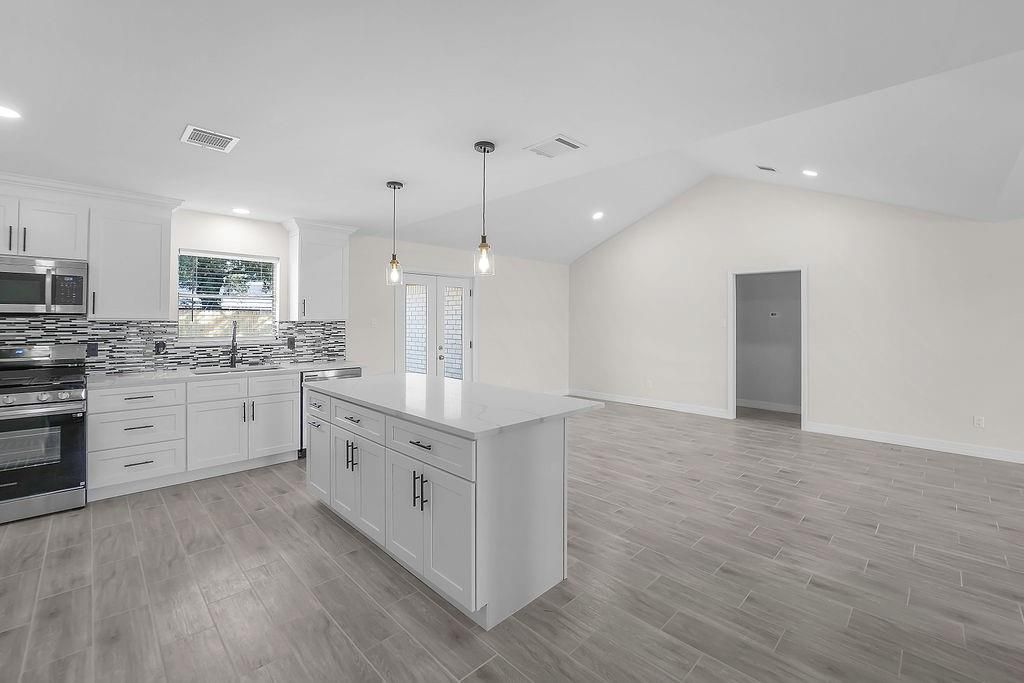 Interior, Kitchen, Pendant Lights, Recessed Lighting, Stainless Steel Appliances, Wood Texture Flooring