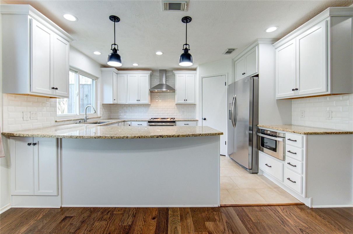 Interior, Kitchen, Pendant Lights, Recessed Lighting, Stainless Steel Appliances, Wood Texture Flooring