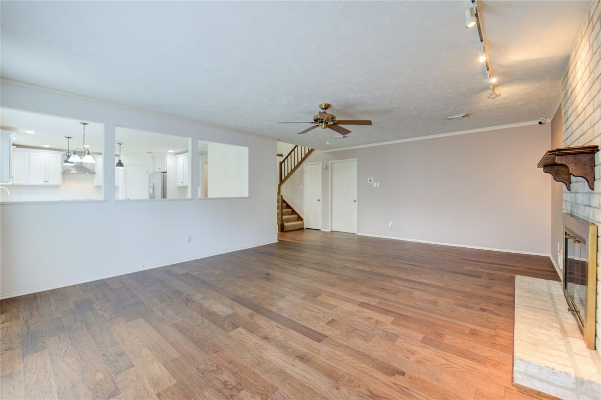 Empty room, Fireplace, Interior, Pendant Lights, Wood Texture Flooring