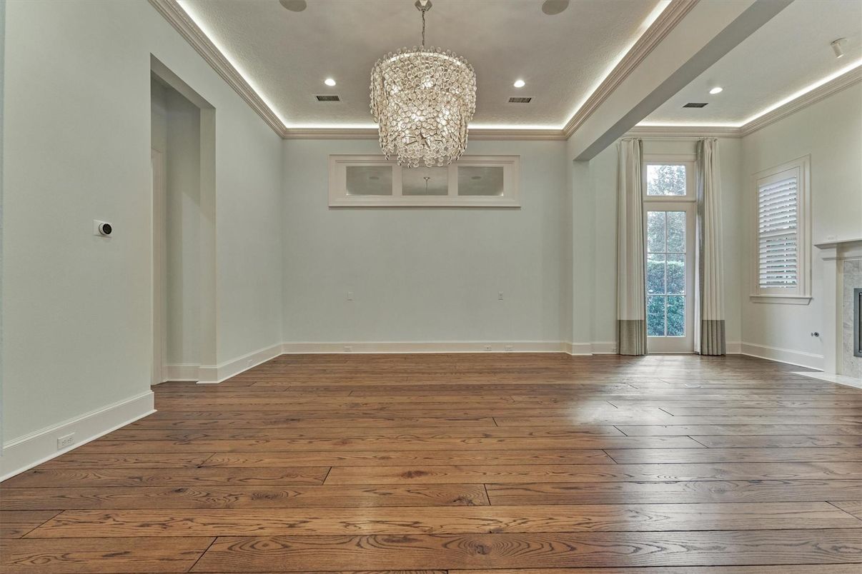 Chandelier, Empty room, Fireplace, Interior, Recessed Lighting, Wood Texture Flooring