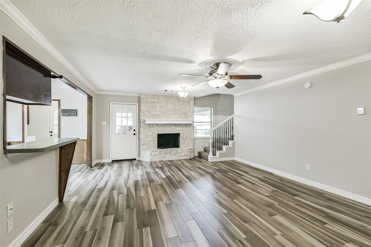 Empty room, Fireplace, Interior, Stone Walls, Wood Texture Flooring
