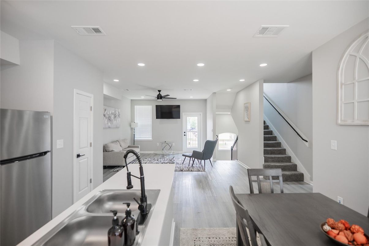 Dining room, Interior, Kitchen, Recessed Lighting, Stainless Steel Appliances, Wood Texture Flooring