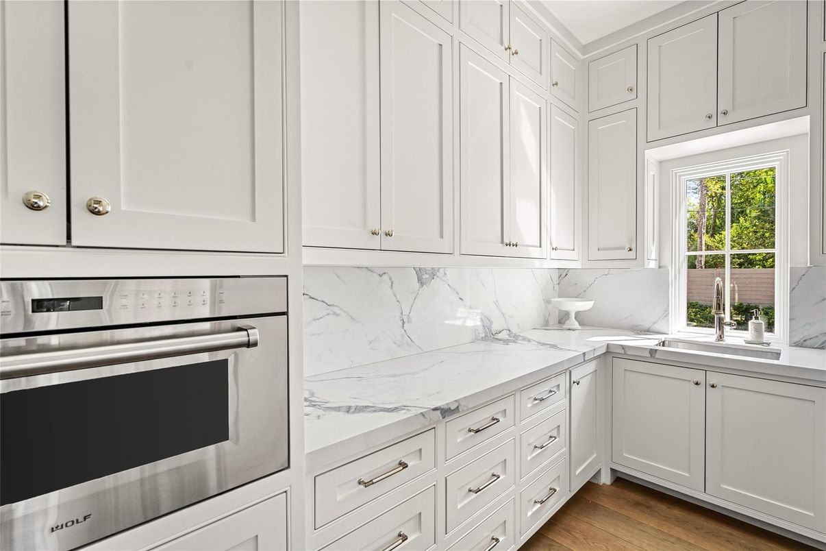 Interior, Kitchen, Marble Walls, Stainless Steel Appliances, Wood Texture Flooring