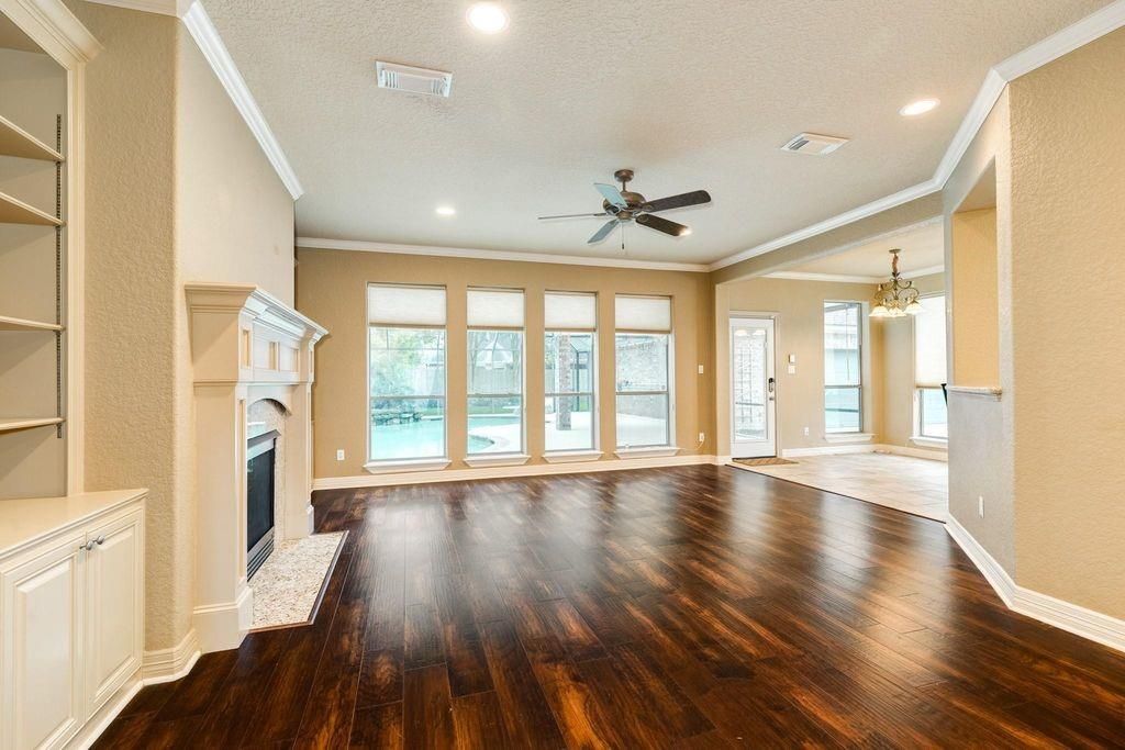 Chandelier, Empty room, Fireplace, Interior, Recessed Lighting, Wood Texture Flooring