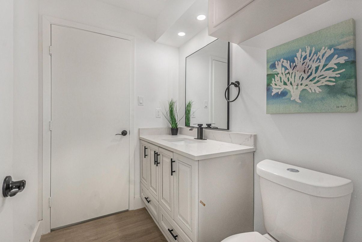 Bathroom, Dual Sink Vanities, Interior, Recessed Lighting, Wood Texture Flooring