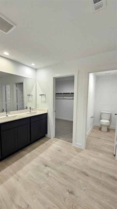 Bathroom, Dual Sink Vanities, Interior, Recessed Lighting, Wood Texture Flooring