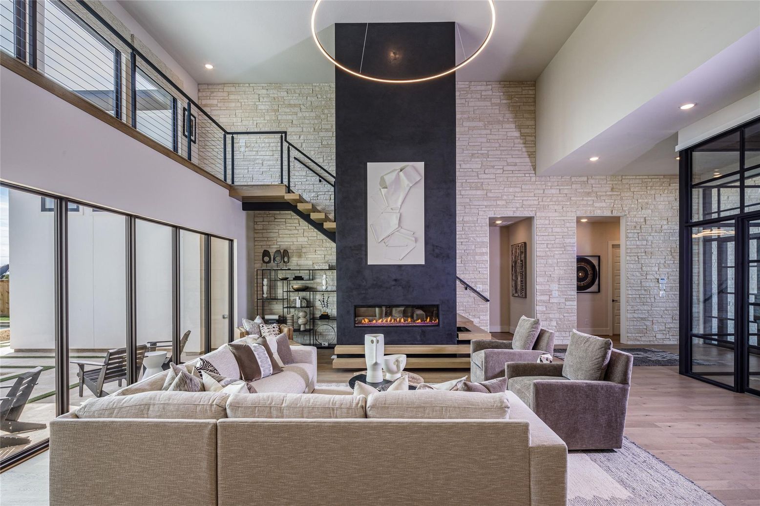 Fireplace, Interior, Living room, Recessed Lighting, Stone Walls, Wood Texture Flooring