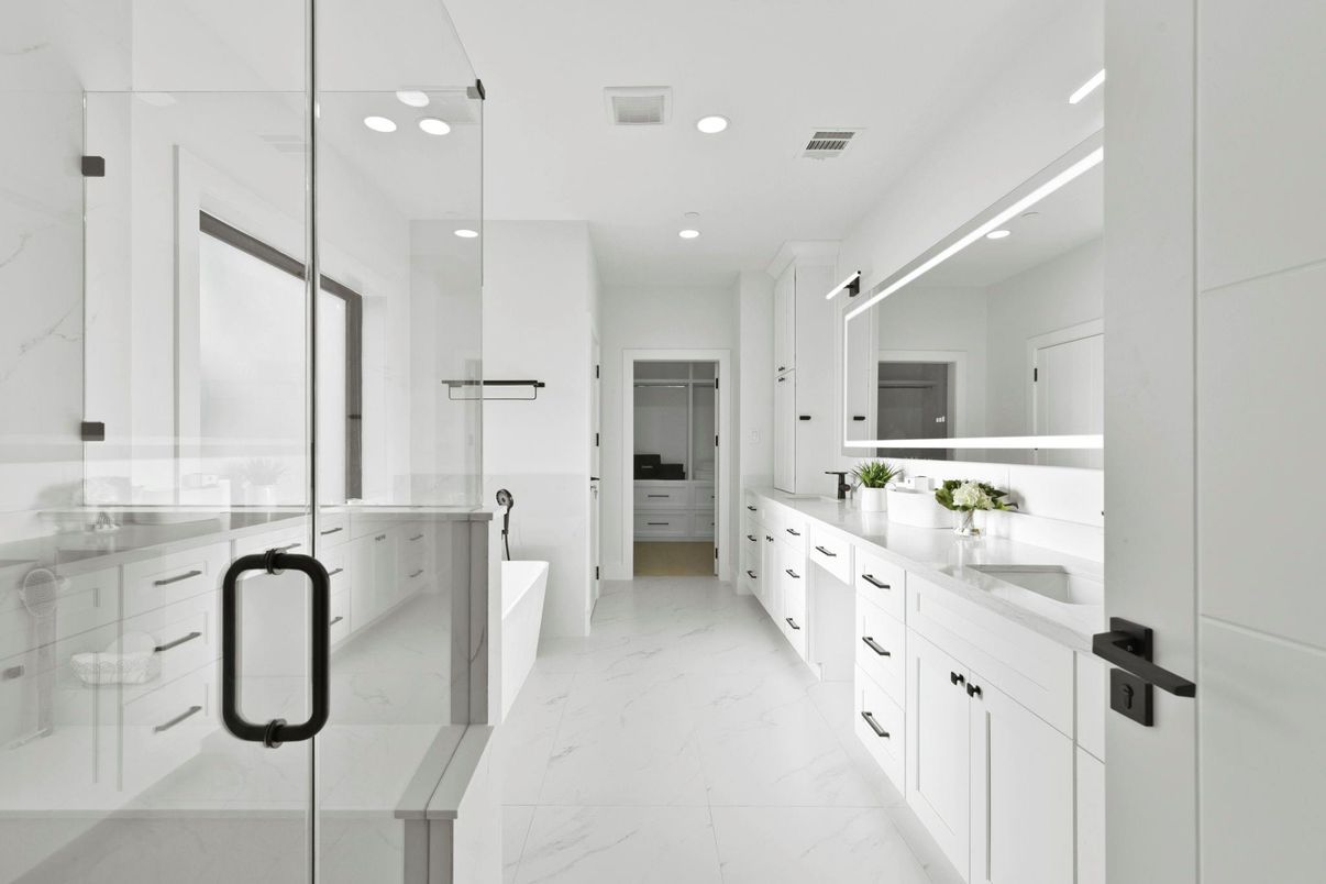 Bathroom, Dual Sink Vanities, Glass Shower, Interior, Marble, Marble Walls, Recessed Lighting