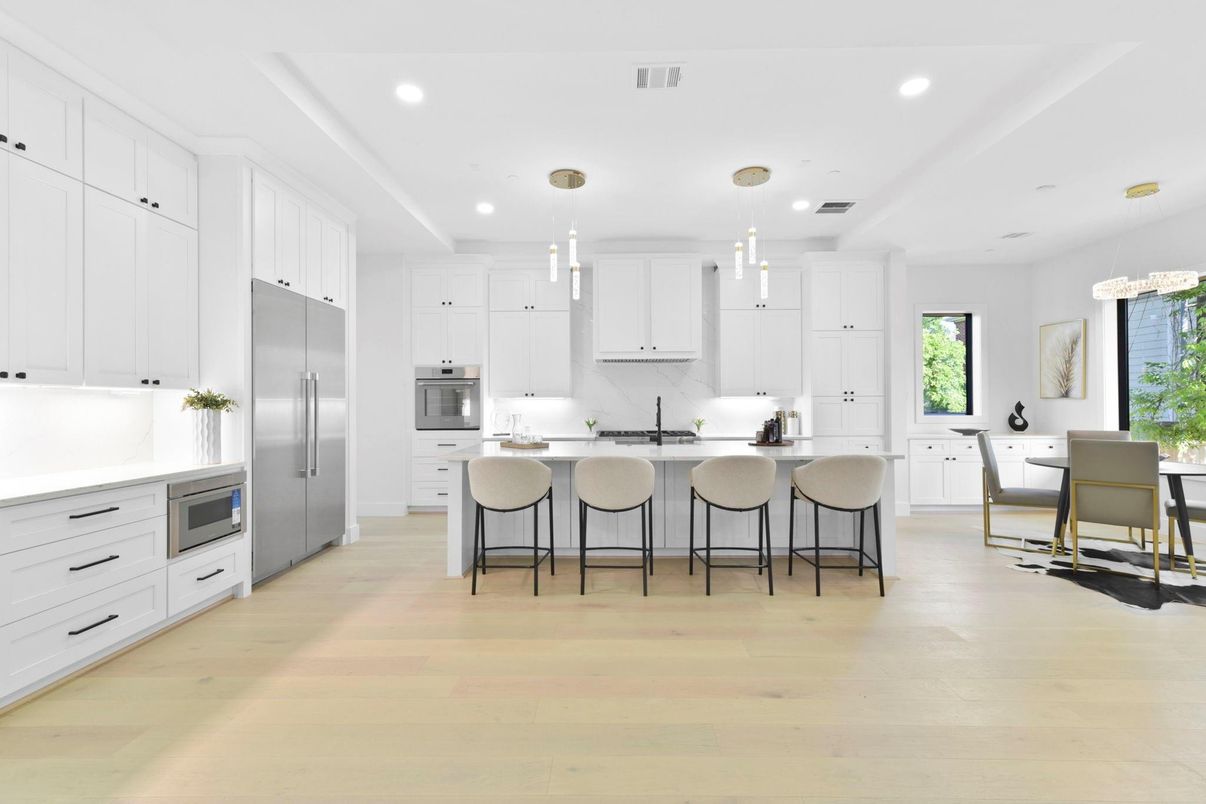 Dining room, Interior, Kitchen, Pendant Lights, Recessed Lighting, Stainless Steel Appliances, Wood Texture Flooring