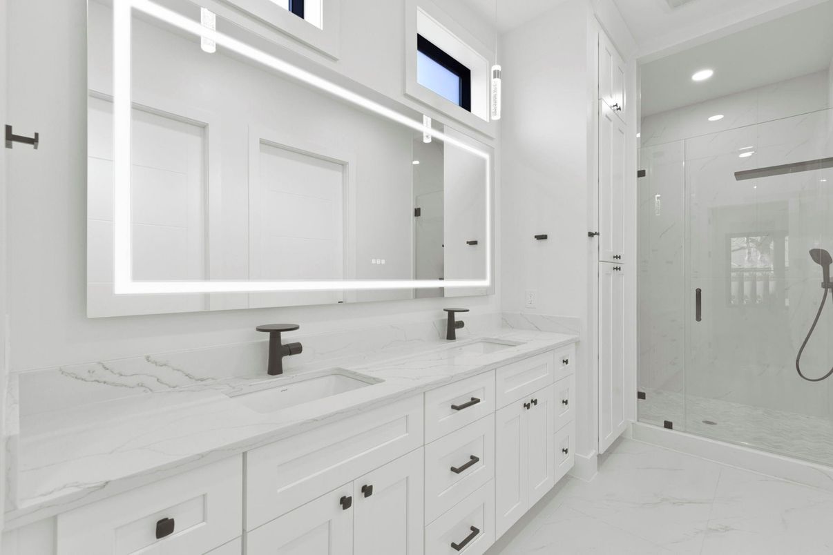 Bathroom, Dual Sink Vanities, Glass Shower, Interior, Marble, Marble Walls, Recessed Lighting