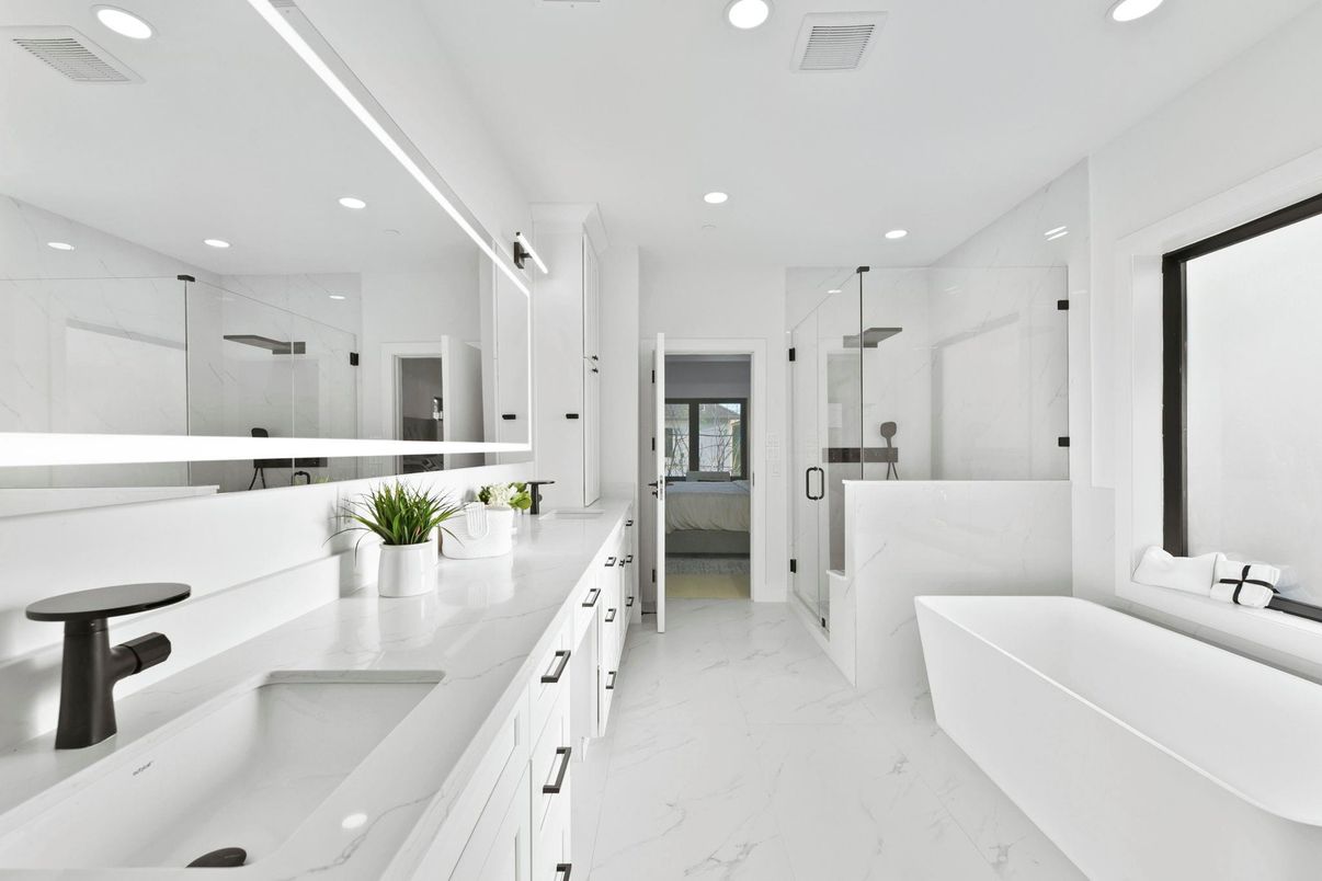 Bathroom, Dual Sink Vanities, Free Standing Baths, Glass Shower, Interior, Marble, Marble Walls, Recessed Lighting