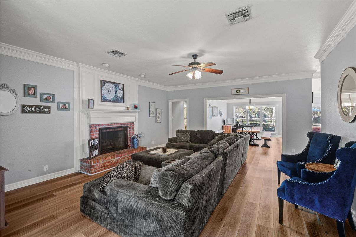 Dining room, Fireplace, Interior, Living room, Pendant Lights, Wood Texture Flooring