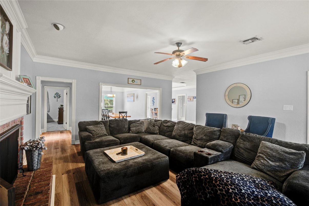 Dining room, Fireplace, Interior, Living room, Pendant Lights, Wood Texture Flooring