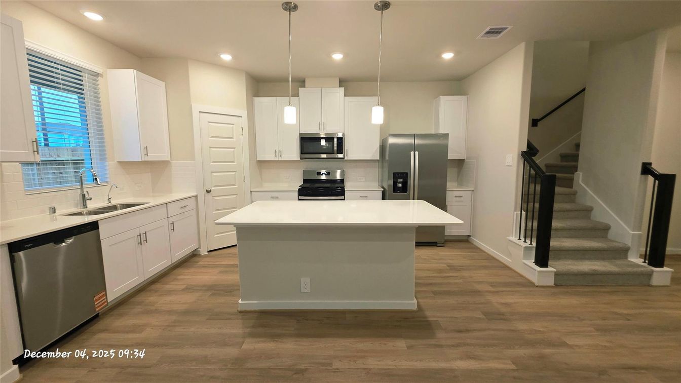 Interior, Kitchen, Pendant Lights, Recessed Lighting, Stainless Steel Appliances, Wood Texture Flooring