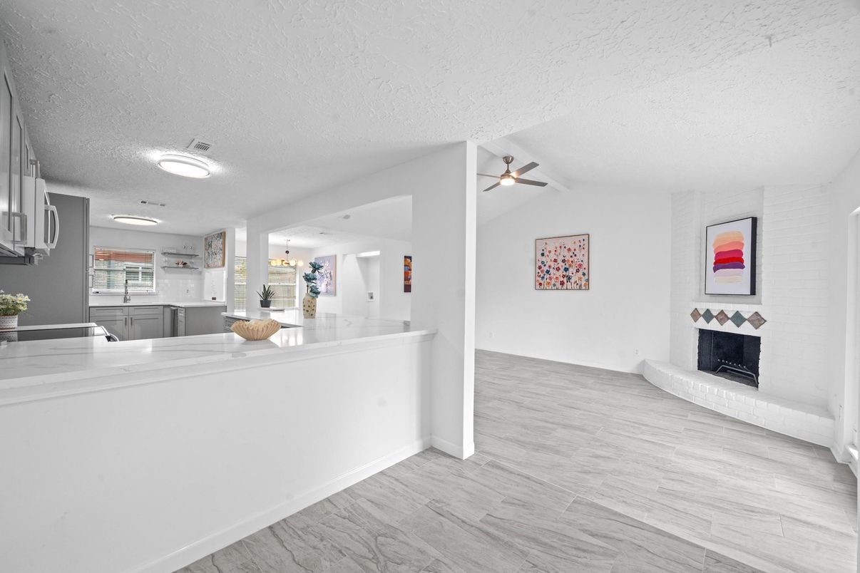 Fireplace, Interior, Kitchen, Recessed Lighting, Wood Texture Flooring