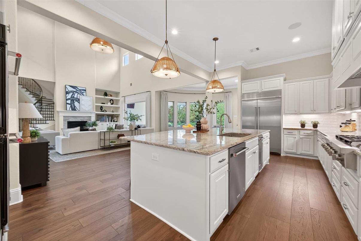 Fireplace, Interior, Kitchen, Living room, Pendant Lights, Recessed Lighting, Stainless Steel Appliances, Wood Texture Flooring